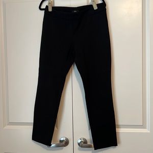 Ladies black pull on slim leg pants.